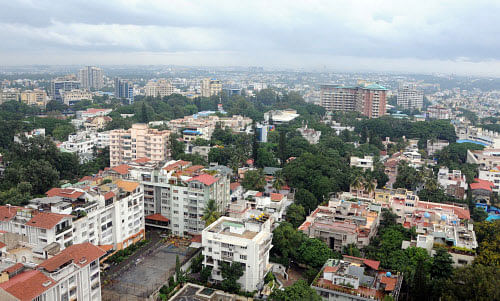 Liberal issuance of No Objection Certificates (NoCs) and unmonitored sanction of building plans by government agencies are what have  led to Bangalore's unplanned development.  DH photo
