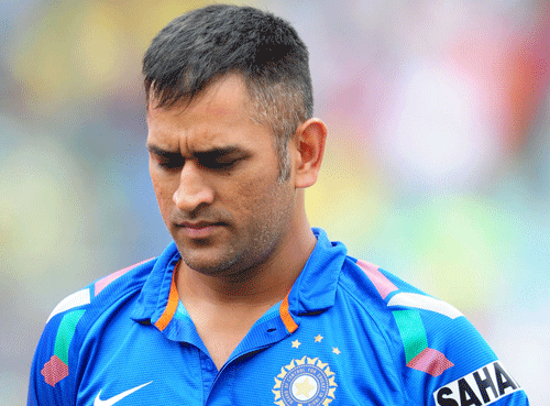 A court in Andhra Pradesh Tuesday issued an arrest warrant against Indian cricket team captain M.S. Dhoni for allegedly hurting the religious sentiments of Hindus. AP file photo