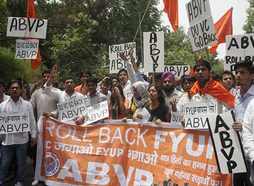 ABVP activists protest against the four-year undergraduate programme (FYUP) of Delhi University in New Delhi on Saturday. PTI Photo