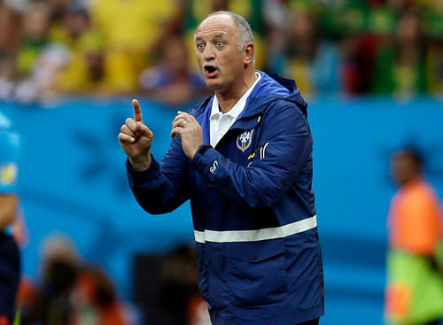 Brazil's defence may have given their fans the jitters in their three World Cup games so far but coach Luiz Felipe Scolari said he did not have "one drop of fear" about his back four after the 4-1 win over Cameroon on Monday. / AP Photo