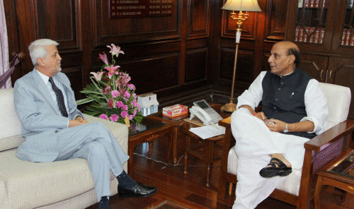Union Home Minister Rajnath Singh and Governor of Goa, B.V. Wanchoo at a meeting in New Delhi on Tuesday. PTI Photo