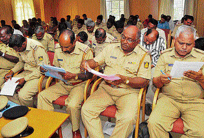 Policemen participate in a workshop on 'Safe Rescue and Safe Rehabilitation of Children Trafficked for Child Labour' organised in the City on Tuesday. DH photo