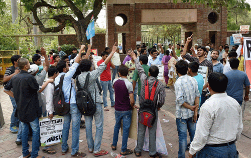 AISA activists shout slogans during a protest over controversial FYUP at Delhi University campus. PTI photo
