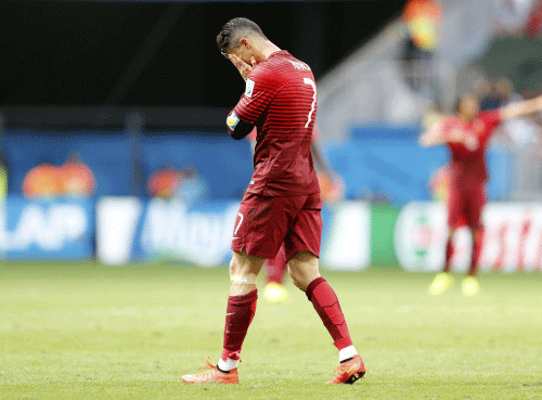 Portugal's Cristiano Ronaldo reacts at the end of their 2014 World Cup Group G soccer match against Ghana at the Brasilia national stadium in Brasilia June 26, 2014. REUTERS