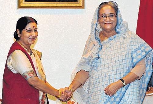 Bangladesh Prime Minister Sheikh Hasina greets External Affairs Minister Sushma Swaraj in Dhaka on Thursday. Reuters photo