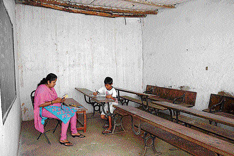 Sri Gururaja High School in Jayanagar looks deserted, with just one student in one of the three classrooms.DH photo
