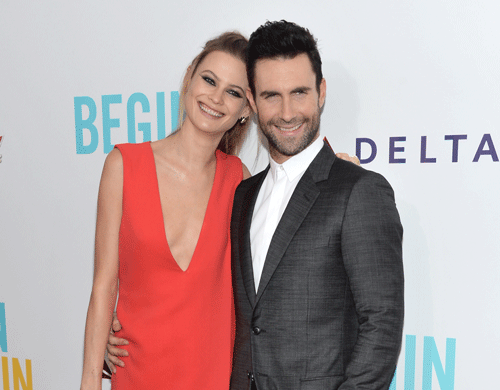 Behati Prinsloo and Adam Levine arrive at the New York premiere of 'Begin Again' on Wednesday, June 25, 2014, in New York. AP