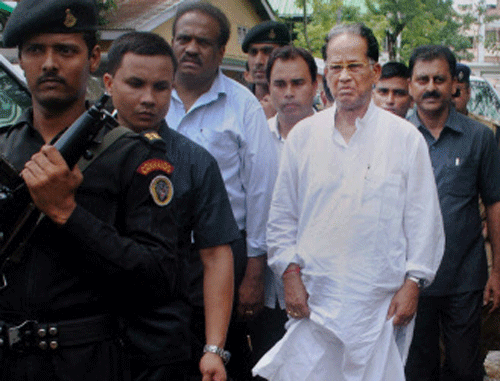 Guwahati : Assam Chief Minister Tarun Gogoi visits flood affected MLA Hostel at Assam Secretariat, following heavy rains in Guwahati on Friday. AP Photo