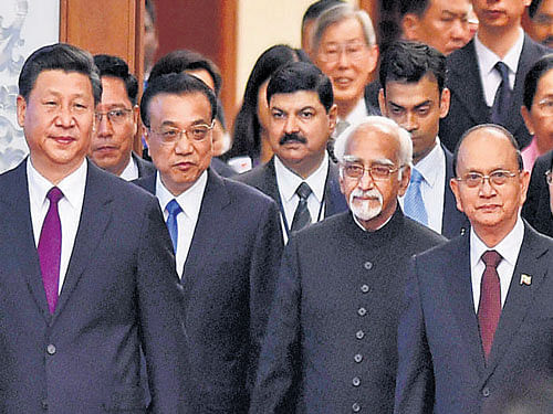 Chinese President Xi Jinping and Premier Li Keqiang with Vice-President Hamid Ansari and Myanmar President Thein Sein in Beijing for the commemoration of the 60th Anniversary of the Panchsheel Treaty on Saturday. PTI