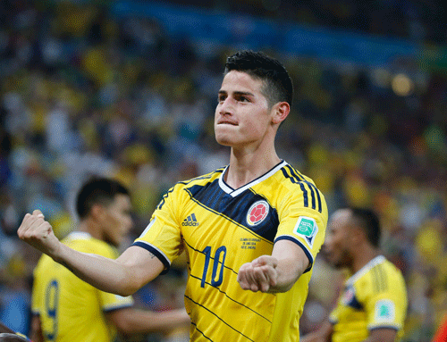 Colombia's James Rodriguez celebrates after scoring against Uruguay during their 2014 World Cup round of 16 game at the Maracana stadium in Rio de Janeiro June 28, 2014. REUTERS