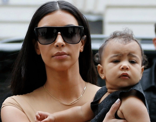 Reality TV star Kim Kardashian's 12-month-old daughter North became the target of a racial slur while onboard a plane last month. Reuters file Photo