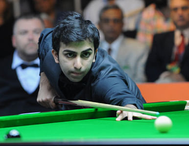 Indian cueist Pankaj Advani today created history by becoming the first player in the world to win world titles in the long and shorter formats of both billiards and snooker by pocketing the IBSF World 6-Red snooker Championship, here. DH file photo