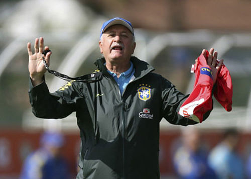Brazil boss Luiz Felipe Scolari said his team were three steps from heaven after beating Chile on penalties to reach the World Cup quarter-finals on Saturday / Reuters