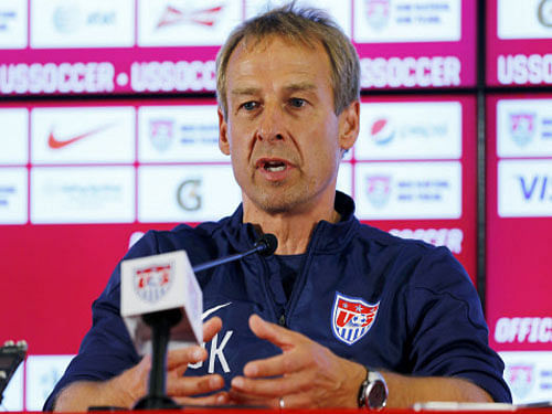 United States coach Juergen Klinsmann has told his players to get their families to change their return flights from Brazil until after the World Cup final. Reuters photo