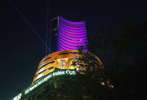Rising for the third session, the benchmark Sensex today closed 103 points up at a two-week high after an uptick in manufacturing sector growth and signs of pickup in auto sales outweighed concerns of a poor monsoon. Reuters file photo