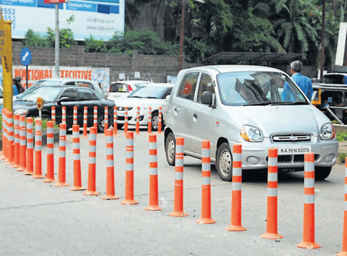In a bid to reduce traffic congestion in the City through better traffic management, the traffic police in the City have started installing tubular cones and humps.  DH photo