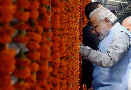 Prime Minister Narendra Modi boards the inaugural train on the Katra-Udhampur rail link after its inauguration, at Katra Railway Station on Friday. PTI Photo