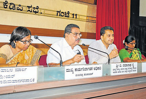 District-in-Charge Minister Ramanath Rai speaks at tri-monthly KDP review meeting in                 Mangalore on Saturday. ZP CEO Tulasi Maddineni, DC A B Ibrahim, ZP President Asha Thimmappa Gowda and others look on. DH Photo