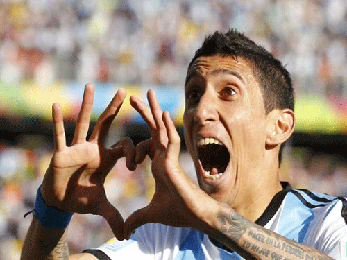 Argentina's Angel Di Maria will undergo a scan on his injured thigh after the midfielder hobbled out of their quarterfinal win over Belgium on Saturday, with local media suggesting his World Cup could be over. Reuters file photo