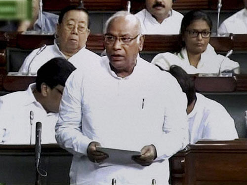 Congress leader in the Lok Sabha Mallikarjun Kharge today met Speaker Sumitra Mahajan and formally staked the party's claim to the post of Leader of Opposition in the House, an issue that has got embroiled in a controversy. PTI photo