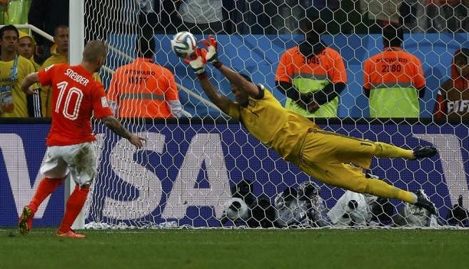 Argentina's goalkeeper Sergio Romero saves the third penalty shot from Wesley Sneijder of the Netherlands during a penalty shootout in their 2014 World Cup semi-finals at the Corinthians arena. Reuters photo