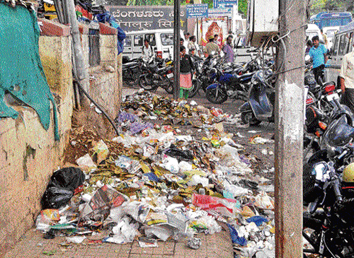 Dirty:  Piles of garbage in front of the Bangalore City Railway Station.  DH Photos by BK Janardhan.