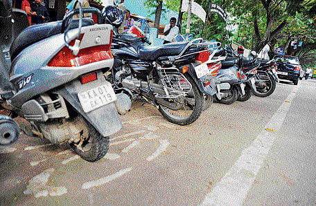 what's the use? The cycle tracks marked by the Department of Urban Land Transport have turned into parking zones. Dh Photo
