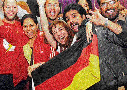 Over the moon: German fans celebrate the country's victory in the football World Cup during a screening of the match organised by the German Consulate at a hotel in the City on Sunday. dh photos/s k dinesh
