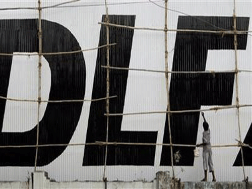 India's largest realty firm DLF is planning to raise up to Rs 3,500 crore through issue of securities backed by IT-SEZs to replace its costlier debt. Reuters file photo