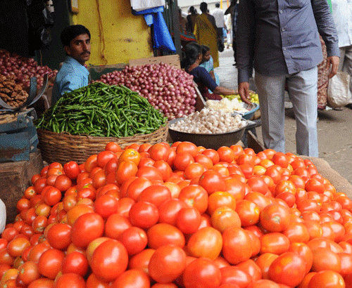As consumers wait for onion prices to cool down, retail prices of tomatoes have skyrocketed to Rs 60 per kg in the national capital. DH file photo