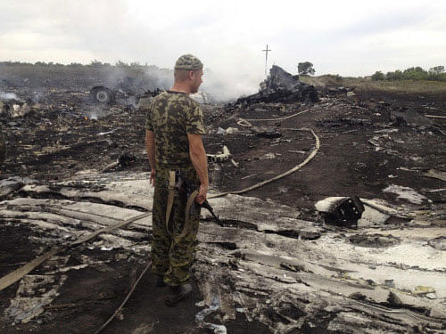 According to recordings of intercepted phone calls between Russian military intelligence officers and rebels, pro-Russian separatists admit to have downed the Malaysia Airlines flight MH17 that crashed Thursday over Ukraine, Security Service of Ukraine (SBU) said Friday. Reuters photo