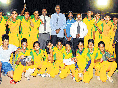 Bishop Cotton Boys' School, the winners of the under-14 Cottonian Shield cricket tournament in Bangalore on Friday. They defeated St Joseph's Boys High School in the final. STANDING: Sohan L, Vinay, Rohan, Shrikar, Anil Dutt, John Zachariah, (Principal), Ramdas (coach), Thambidurai (Vice-principal), Jonah, Aryan, Mihir Rajesh (captain), Tanuj, Prithviraj (coach). KNEELING (From left) Purva Hegde, Pranav, Varun, Bradley, Emmanuel, Aneesh, Tarun, Raghav, Ayush. DH photo