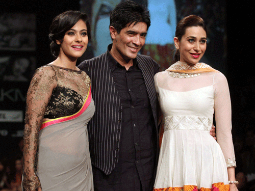 At 47, ace fashion designer Manish Malhotra is among the country's most eligible bachelors. But he says he marries his ''fashion shows'' every six months. PTI file photo