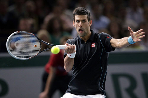 Serbian Novak Djokovic sits atop the ATP singles rankings with 13,130 points while Spaniard Rafael Nadal is not far behind in second place with 12,670 points. AP file photo