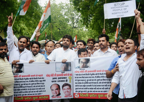 Youth Congress activists protested against the death of a Manipuri youth, at Jantar Mantar in New Delhi on Tuesday. PTI Photo