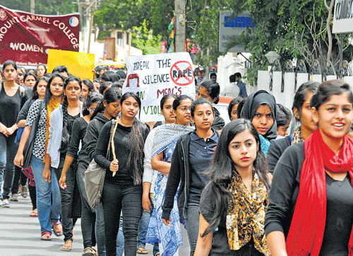 UNITED: The students of Mount Carmel College took out a silent protest march. DH photo by SK Dinesh