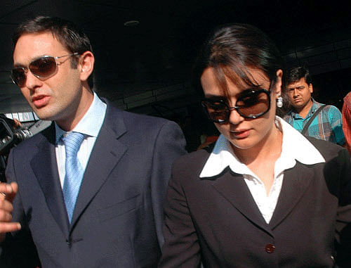 Bollywood actor Preity Zinta, who has accused industrialist Ness Wadia of molestation, said her former boyfriend had thrown burning cigarettes at her and locked her up in a room even before the May 30 incident at Wankhede Stadium after which she filed a police complaint. PTI photo