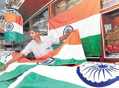 As the State government has tightened its laws banning the sale of plastic flags, indigenous flags made at the State's only tri-colour making unit at&#8200;Garaga in&#8200;Dharwad district, has been in much demand in the city. DH photo