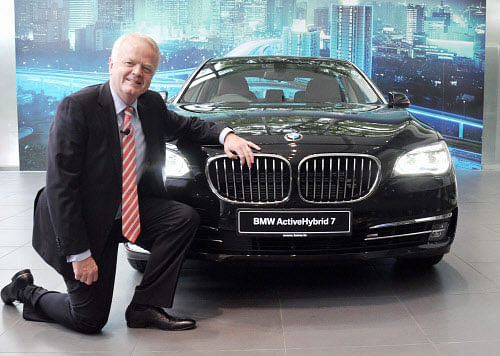 Philipp von Sahr, President, BMW Group India with the newly launched BMW Active Hybrid 7 car in Gurgaon on Wednesday. PTI Photo