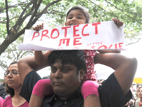 Recent rape of a six-year-old girl in a Bangalore school has 'refocused' attention on sexual abuse of children in India, a human rights body said, and demanded immediate and rigourous implementation of Protection of Children from Sexual Offences Act from the government. DH photo of Bangalore rape protest