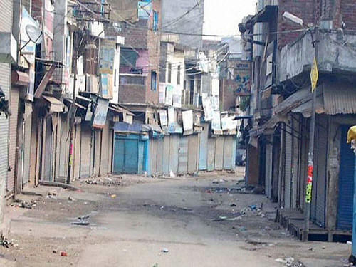 Twenty people were arrested as curfew and shoot-at-sight orders today remained in force in the city hit by clashes between two communities over a land dispute. PTI photo