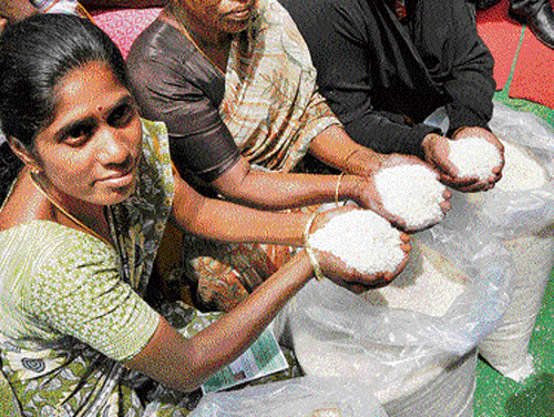 Below poverty line families are being provided rice at Re 1 per kg. dh photo