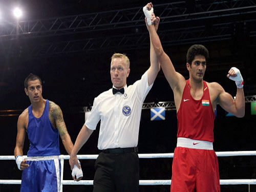 Olympic and World Championship bronze-medallist Vijender Singh led the charge as five Indian boxers, including two women, assured themselves of medals at the 20th Commonwealth Games by advancing to the semifinals of their respective weight categories here. PTI photo