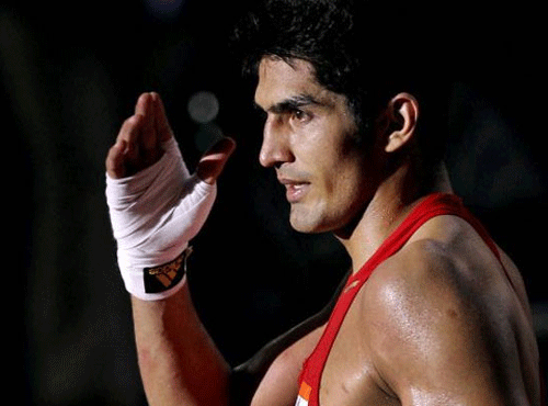 Olympic and World Championship bronze-medallist Vijender Singh led the charge as five Indian boxers, including two women, assured themselves of medals at the 20th Commonwealth Games by advancing to the semifinals of their respective weight categories here. PTI file photo