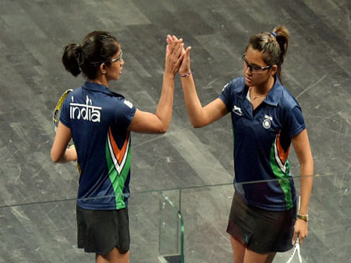 Dipika Pallikal and Joshana Chinappa created history by winning the first-ever gold medal in squash. They beat Jenny Duncalf and Laura Massaro of England 11-6, 11-8 in the womens doubles squash final. It was the first squash medal for India in the Commonwealth Games. PTI photo