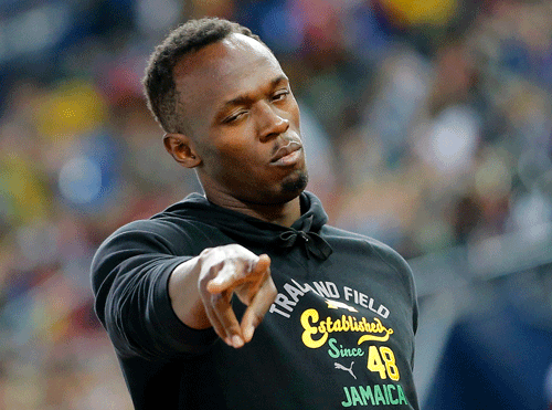 Six-times Olympic champion Usain Bolt steered Jamaica to a comfortable victory in their 4x100 metres relay heat in front of an expectant crowd at the Commonwealth Games on Friday. AP Photo