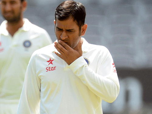 Mahendra Singh Dhoni's insistence to press charges against James Anderson came under attack from the British media on Saturday which said it 'smacked of opportunism' and the exoneration of the paceman was 'humiliation' for India. Reuters file photo