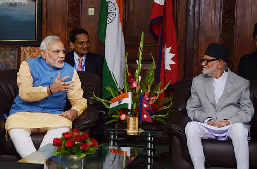 Prime Minister Narendra Modi with his Nepalese counterpart Sushil Koirala during a meeting at PMO Chambers, Singha Durbar in Kathmandu, Nepal on Sunday. PTI Photo