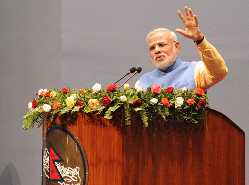 India's Prime Minister Narendra Modi gestures while addressing the parliament in Kathmandu August 3, 2014.  Reuters  photo