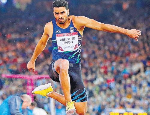 rpinder Singh en route to the triple jump bronze medal at the Commonwealth Games. AP